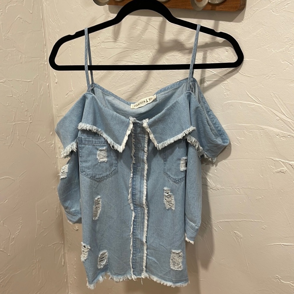 Off the shoulders torn lightweight denim button up shirt size large.